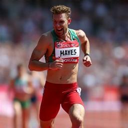 Liam Hayes celebrating finish line